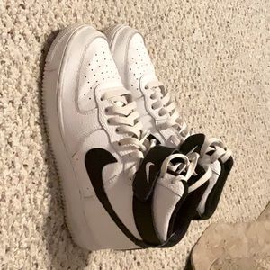 Lightly used high top black and white Nike Air Force ones.